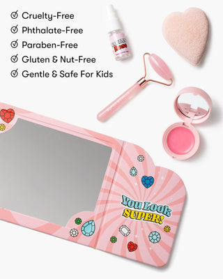 Super Smalls Mom's Beauty Starter Kit
Pink makeup set with mirror, roller, and other items on a white background, featuring safety certifications.