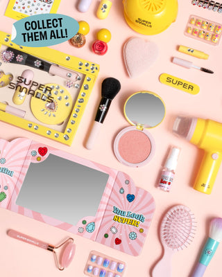 Super Smalls Mom's Beauty Starter Kit
Collection of makeup and beauty products on a pink background with 'Super Smalls' branding.