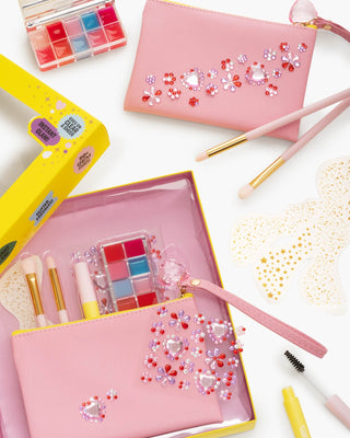 Super Smalls Party Prep Beauty Kit
Makeup set with pink case, brushes, and lip products on a white background