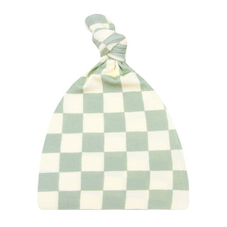 Lou Lou and Company Knit Top Knot Hat in Swamp checkered pattern, featuring a cozy, stylish knit design for babies or toddlers.