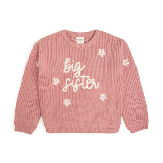 Sweet Wink Big Sister Knit Sweater
Pink sweater with 'big sister' text and flower patterns on a white background