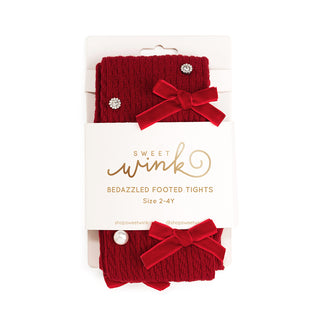 Sweet Wink Bedazzled Coquette Tights - Ruby Red
Red bedazzled footed tights with bows and 'Sweet Wink' packaging on a white background