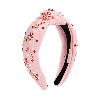 Sweet Wink Candy Cane Christmas Gemstone Headband - Womens
Pink headband with candy cane and pearl decorations on a white background