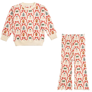Sweet Wink Christmas Cutie Sweatshirt & Flare Legging Set
Christmas-themed pajama set with patterned shirt and pants on a white background