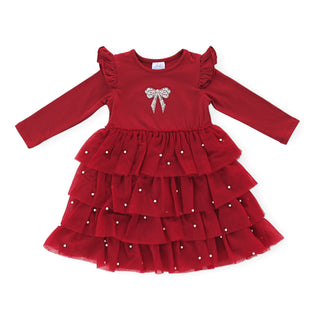 Sweet Wink Christmas Pearl Long Sleeve Tutu Dress
Red dress with a bow design on a white background