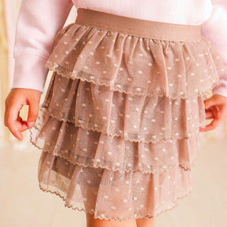 Sweet Wink Coco Ruffle Tutu Skirt
Beige tiered skirt with white polka dots on a plain background