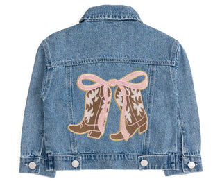 Sweet Wink Cowgirl Cutie Patch Western Denim Jacket
Denim jacket with cowboy boots and a pink bow design on the back, on a white background.