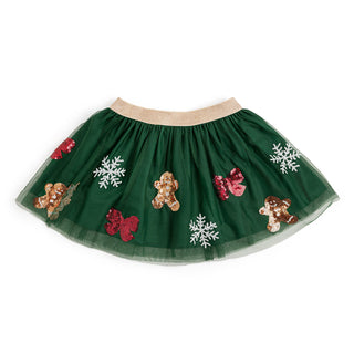 Sweet Wink Gingerbread Joy Sequin Christmas Tutu
Green skirt with gingerbread men, snowflakes, and sequin details on a white background