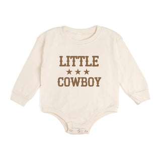 Sweet Wink Little Cowboy Western Long Sleeve Romper
Beige baby onesie with 'Little Cowboy' text on a white background