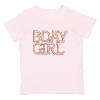 Sweet Wink Pearl BDay Girl Patch Short Sleeve T-Shirt - Ballet
Pink t-shirt with 'BDAY GIRL' text in gold on a white background