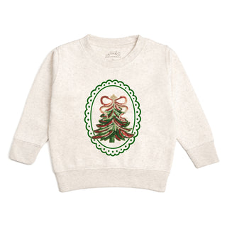 Sweet Wink sequin Christmas tree patch sweatshirt featuring festive sequin embroidery on a cozy sweater.
