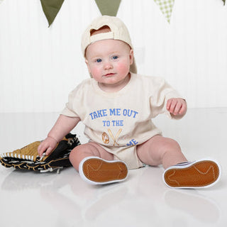 Sweet Wink Take Me Out To The Ballgame short sleeve romper in natural, modeled on a person, showcasing casual summer style.