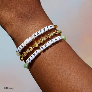 Little Words Project Bracelet - Disney Princess: Tiana
Bracelets with motivational phrases on a wrist, featuring Disney branding.