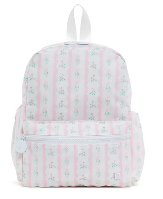 Pink floral ribbon mini backpack by TRVL Designs, featuring a compact design with colorful ribbon floral pattern.