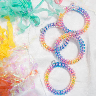 Teleties Eat Glitter For Breakfast Hair Ties - Small
Colorful beaded bracelets on a white background with colorful ribbons.