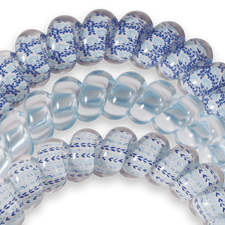 Teleties Hampton Bay Hair Ties - Large
Close-up of clear plastic beads with blue patterns on a transparent background