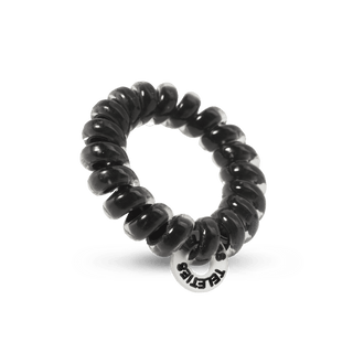 Teleties Jet Black Hair Ties - Tiny
Black hair tie with a brand logo on a transparent background