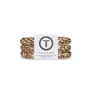 Teleties Leopard Hair Ties - Small
Set of hair ties with a brand label on a green background