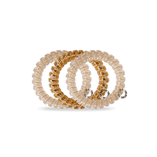 Teleties Luxury Living Hair Ties - Large
Set of three beaded hair ties in gold and beige on a transparent background