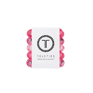 Teleties Pretty in Pink Hair Ties - Tiny
Stack of pink hair ties with a white label featuring 'Teleties' logo on a transparent background