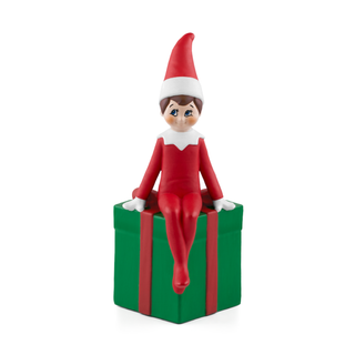 Tonies Character: The Elf on the Shelf
Elf on the Shelf figurine sitting on a green present with red ribbons against a white background
