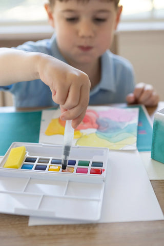 Tiny Easel traveling arts and crafts easel, compact and portable for painting and drawing on the go.