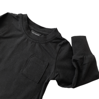 Little Bipsy Long Sleeve Pocket Tee - Black
Black long-sleeve shirt with a pocket on a white background