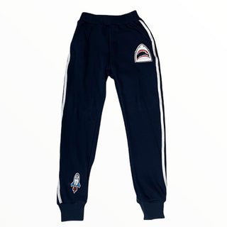 Lola and The Boys Varsity Patch Jogger Set - Navy
Navy blue sweatpants with white stripes and embroidered designs on a white background