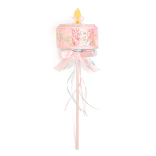 Sweet Wink Birthday Girl Wand 
Decorative cake with a candle on a stick against a white background