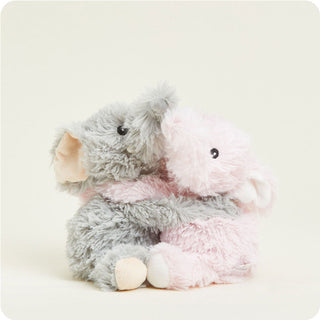 Warmies Elephant Hugs
Two plush elephants, one gray and one pink, sitting together on a white background.