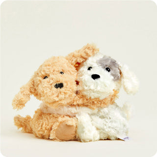 Warmies Puppy Hugs
Two plush dog toys, one brown and one white with gray fur, on a light gray background.