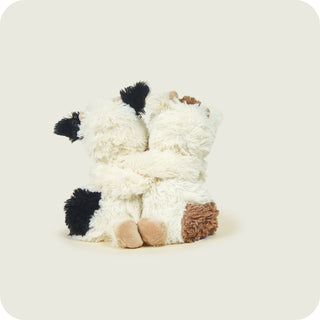 Warmies Cow HUGS
Plush toy resembling a black, white, and brown animal on a light gray background