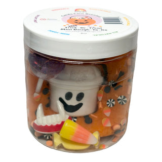 White Bucket EGKD Candy Corn Scented Mini Halloween Dough-To-Go Jar 
Jar of Halloween-themed mini dough figures with a ghost, candy corn, and other items.