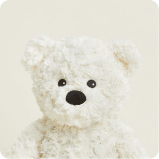 Cream Curly Bear Warmies
White teddy bear with black eyes and nose on a light beige background