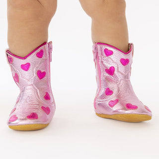 Wild & Rae Cowgirl Baby Bootie in Lovestruck design, pink and brown leather boots with decorative stitching for infants.