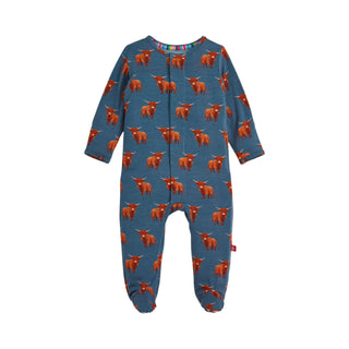 Magnetic Me Word To Your Herd Modal Footie Children's onesie with red cow pattern on a blue background