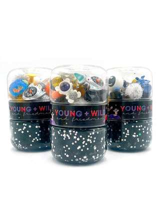 Young Wild and Friedman Space-themed slime in a Grab & Go dough jar, featuring a vibrant, cosmic design with swirling colors.