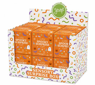 Young Wild and Friedman Halloween Sensory Surprise Box
Display of 'A Little Spooky Surprise' sensory boxes with colorful patterns and 'Yup!' branding.