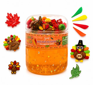 Young Wild and Friedman Slime - Shake Your Tail Feathers
Orange slime in a jar with colorful turkey-shaped toys on a white background
