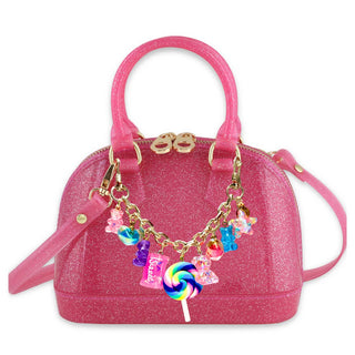 Carrying Kind Cate Handbag - Candy Crush: Hot Pink Sparkle
Pink glitter handbag with colorful charm on a white background