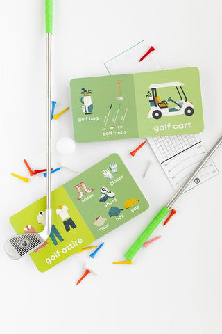 Left Hand Book House golf-themed board book for babies, featuring colorful illustrations of golf balls and clubs.