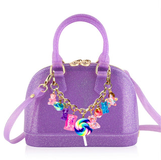 Carrying Kind Cate Handbag - Candy Crush: Purple Sparkle
Purple handbag with colorful charm decorations on a white background