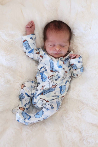 Caden Lane Rodeo Dreams Blue zipper footie for babies, featuring soft fabric and playful rodeo-themed print.