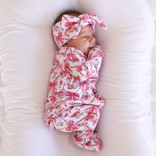 Caden Lane Bow Besties ruffle zipper footie for babies, soft fabric with ruffle details and zipper closure, in a cute design.