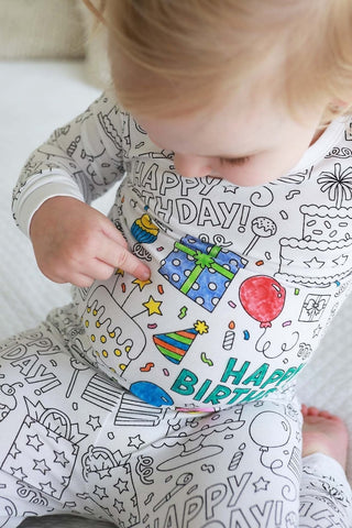 Caden Lane colorable two-piece birthday celebration pajama set for kids, featuring fun printed design and soft fabric.