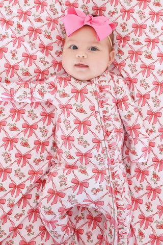 Caden Lane Bow Besties Ruffle Zipper Footie for babies, soft fabric with ruffle details and zipper closure, adorable and comfortable.