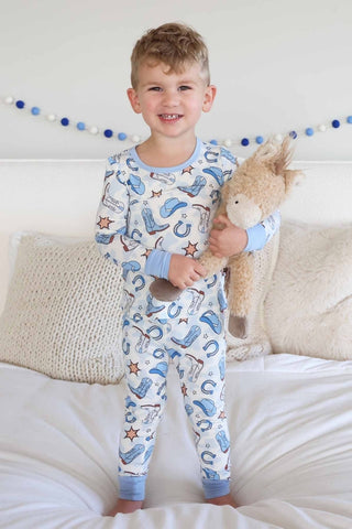 Caden Lane Rodeo Dreams blue two-piece pajama set for women, featuring a comfortable top and matching pants in soft fabric.