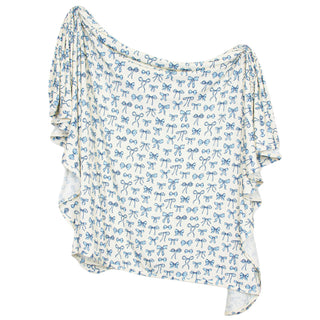 Lou Lou and Company Stella swaddle blanket in soft blue with bow patterns, perfect for newborns and babies.