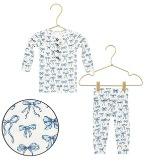 Lou Lou and Company Top and Bottoms - Stella
Children's outfit with blue bow pattern on a white background