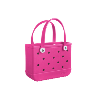 Bogg Bitty Bogg handbag in HAUTE Pink featuring a compact, stylish pink handbag with a top handle and modern design.